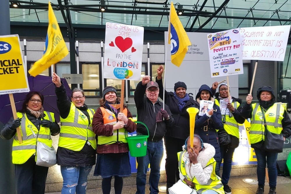 Government outsourced workers strike for living wage